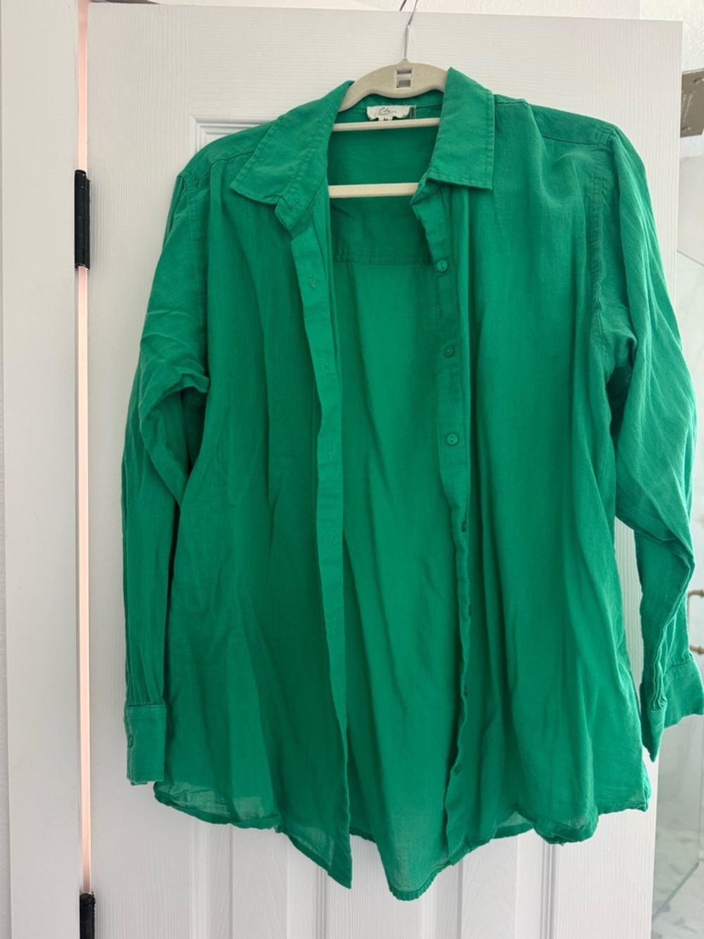 Elan beach shirt size M long enough to cover the right areas.